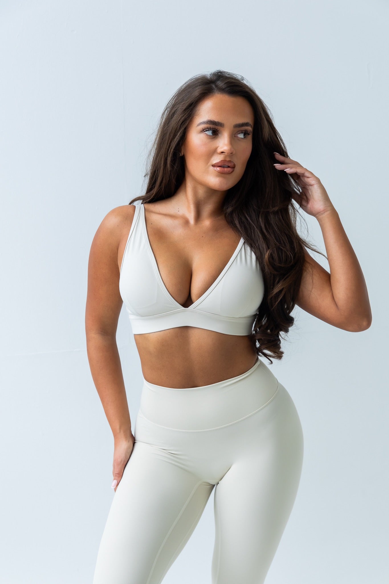 Cream deep cut sports bra