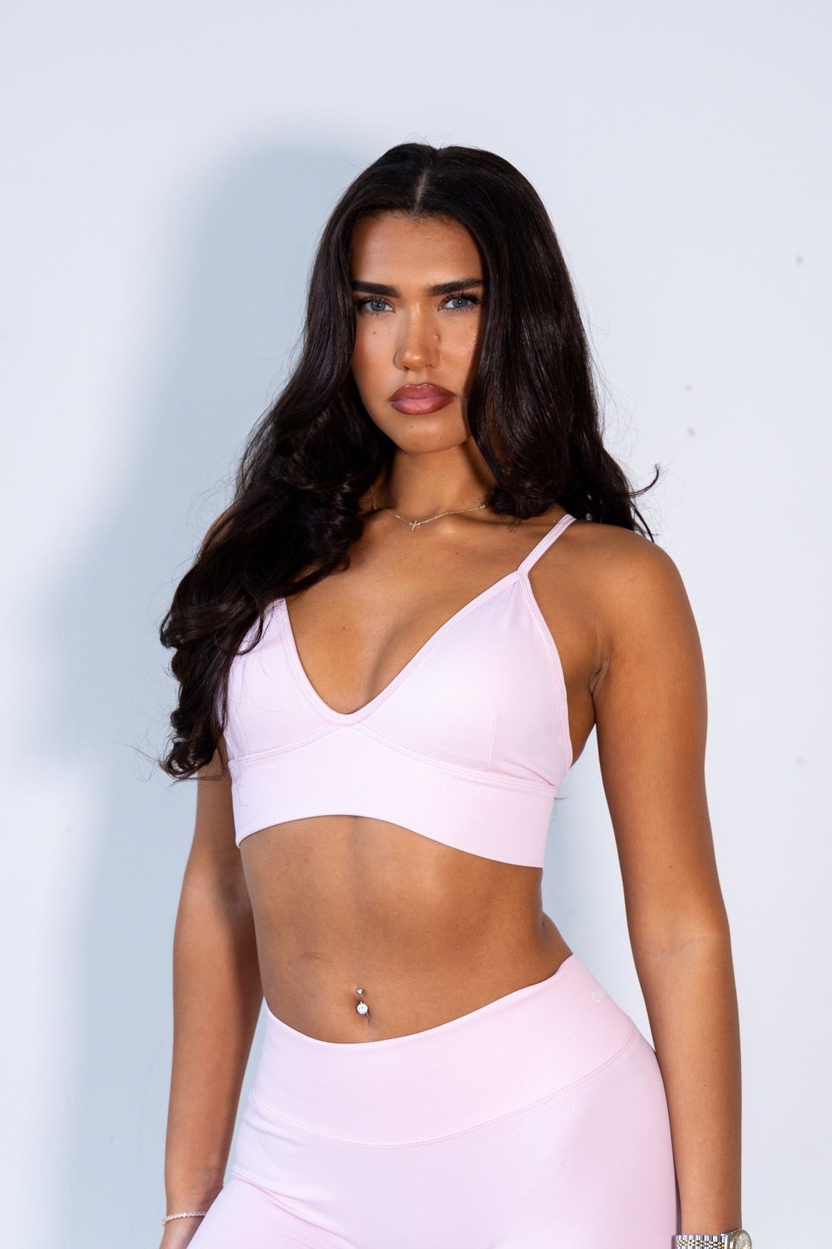 Powder puff pink sports bra