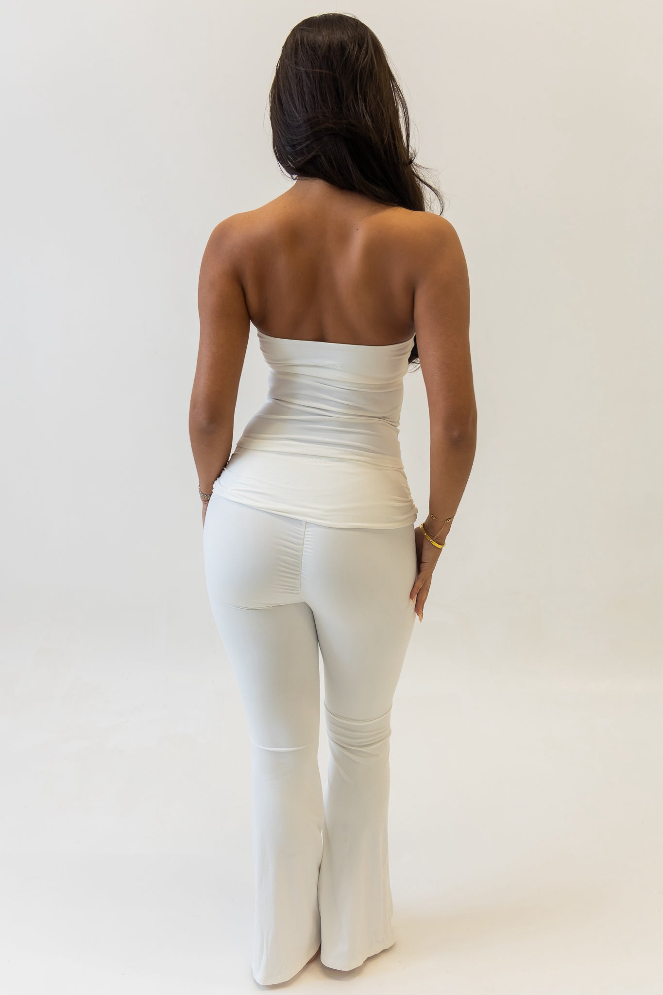 White bandeau top & flare pant two piece set